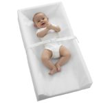 Baby lying on back on the Sealy Soybean Comfort 3-Sided Contoured Diaper Changing Pad
