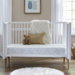 crib in nursery with Em363 mattress